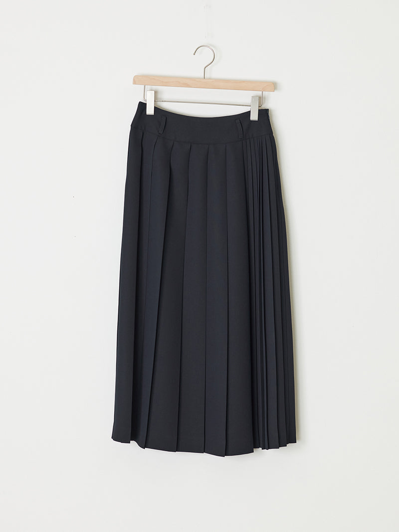 ASYMMETRIC PLEATED SKIRT